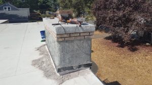 Scratch coat stucco/chimney repair.