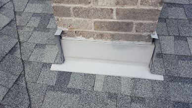 Chimney flashing. Corners are not caulked