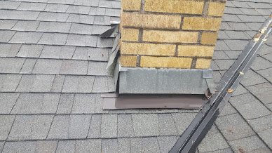 Bent chimney flashing.