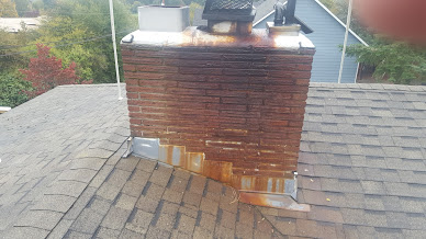 Rusting chimney flashing.