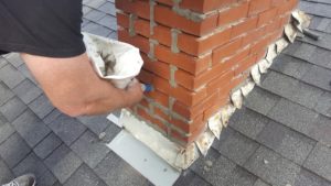 Tuckpointing a chimney